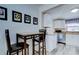 Cozy eat-in kitchen boasts stainless appliances, sleek countertops, and modern flooring at 921 24Th N Ave, St Petersburg, FL 33704