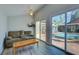 Cozy living room with a view of the pool area, seamlessly blending indoor and outdoor living spaces at 921 24Th N Ave, St Petersburg, FL 33704