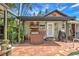 Outdoor kitchen area with a built-in grill, perfect for backyard barbecues and enjoying the outdoor space at 921 24Th N Ave, St Petersburg, FL 33704
