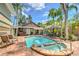 Beautiful backyard pool area surrounded by lush tropical landscaping, offering a private and serene retreat at 921 24Th N Ave, St Petersburg, FL 33704