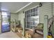 Inviting porch with comfortable seating and pleasant outdoor ambiance at 921 24Th N Ave, St Petersburg, FL 33704