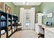 Charming home office with custom built-ins, ample natural light, and pool access at 9801 Pine Leaf Ln, Dade City, FL 33525