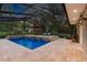 Beautiful screened-in pool area, ideal for relaxation and entertainment, showcasing outdoor living at its finest at 9801 Pine Leaf Ln, Dade City, FL 33525