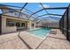 This pool features a screened-in area with a built in bar and room for entertaining at 1018 Tracey Ann Loop, Seffner, FL 33584