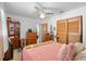 Comfortable bedroom with warm decor and plenty of storage, including a closet at 1021 11Th Nw Ave, Largo, FL 33770