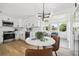 Well-lit kitchen featuring stainless steel appliances, and breakfast nook seating at 13617 Frances Ave, Hudson, FL 34667