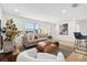Inviting living room with neutral tones, stylish decor, and bright natural light at 13617 Frances Ave, Hudson, FL 34667