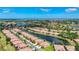 Expansive aerial view showcasing an attractive community with a peaceful waterfront setting at 146 Shell Falls Dr, Apollo Beach, FL 33572