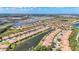 Beautiful aerial view of an attractive, well-maintained residential community with water features at 146 Shell Falls Dr, Apollo Beach, FL 33572