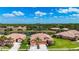 Charming aerial view of a beautiful neighborhood showcasing the lovely homes and landscaping at 146 Shell Falls Dr, Apollo Beach, FL 33572