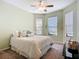 Comfortable bedroom with ceiling fan and lots of natural light at 146 Shell Falls Dr, Apollo Beach, FL 33572