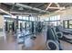 Well-equipped gym with modern equipment, bright lighting and ample space for workouts at 15429 Caravan Ave, Odessa, FL 33556