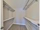Well-organized walk-in closet with shelving providing ample storage and organization space at 1806 Wolf Laurel Dr, Sun City Center, FL 33573