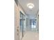 Inviting foyer features a mirrored closet and tile flooring, offering a glimpse of the home's open layout at 1806 Wolf Laurel Dr, Sun City Center, FL 33573