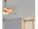 Bright living room boasts high ceilings and a unique ceiling fan fixture at 1806 Wolf Laurel Dr, Sun City Center, FL 33573