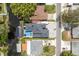 Aerial perspective of a home with a private pool, boat dock and access to a canal at 182 E Canal Dr, Palm Harbor, FL 34684