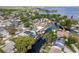 Aerial shot of a waterfront community with homes nestled along canals and direct lake access at 182 E Canal Dr, Palm Harbor, FL 34684
