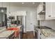 Gourmet kitchen features granite countertops, stainless steel appliances, and custom cabinetry at 182 E Canal Dr, Palm Harbor, FL 34684