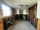 A kitchen featuring exposed framework, a window, and essential plumbing installations at 200 Country Club Dr # 1101, Largo, FL 33771