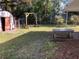 View of the backyard featuring a storage shed and fence at 2001 E Powhatan Ave, Tampa, FL 33610