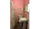 Bathroom with tile and a shower curtain at 2001 E Powhatan Ave, Tampa, FL 33610
