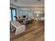 Comfortable living room with a neutral color palette, shuttered windows, and stylish decor at 207 S Coolidge Ave, Tampa, FL 33609