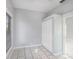 Bedroom with tile flooring, closet, and a window offering natural light at 2317 W Chestnut St, Tampa, FL 33607