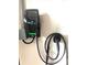 Close up of an electric vehicle charging station installed on a garage wall at 2332 Dekan Ln, Land O Lakes, FL 34639