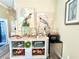 Interior view of a home showcasing a sideboard with decorative items and a microwave at 2332 Dekan Ln, Land O Lakes, FL 34639
