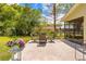 Cozy patio area with a table and chairs, perfect for outdoor dining and entertaining at 24076 Ragan Dr, Brooksville, FL 34601