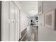 Inviting hallway with modern flooring and stylish decor leading to a bright living space at 2554 Brimhollow Dr, Valrico, FL 33596