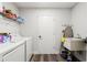 Functional laundry room equipped with modern appliances and ample storage space at 2554 Brimhollow Dr, Valrico, FL 33596