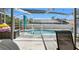 Pool with a patio and a safety fence, perfect for Gathering fun and peace of mind at 2554 Brimhollow Dr, Valrico, FL 33596