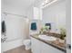 Clean bathroom featuring a shower/tub and ample counter space at 2773 Via Cipriani # 1322A, Clearwater, FL 33764