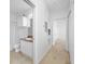 Neutral bathroom with a combined shower and tub and a single sink vanity at 2773 Via Cipriani # 1322A, Clearwater, FL 33764