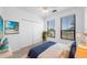 Bedroom featuring natural light from two windows, a double closet, and calming decor at 2773 Via Cipriani # 1322A, Clearwater, FL 33764