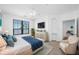 Calm bedroom with large windows and a water view, providing ample natural light at 2773 Via Cipriani # 1322A, Clearwater, FL 33764