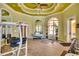 Well-equipped fitness room with state-of-the-art equipment, mirrors, and scenic views at 2773 Via Cipriani # 1322A, Clearwater, FL 33764