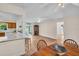 Open concept living room and kitchen with natural light and hardwood floors at 2814 Lomond Dr, Palm Harbor, FL 34684