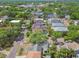 An aerial view showcases the tranquil residential neighborhood and mature green landscape at 2815 W Estrella St, Tampa, FL 33629