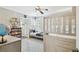 Cozy bedroom featuring a built-in bed, ceiling fan, and ample natural light at 2815 W Estrella St, Tampa, FL 33629