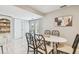 Dining area with a table that has four chairs, which is connected to the kitchen at 2815 W Estrella St, Tampa, FL 33629