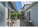 Back patio area with two grills, room to sit, and a well kept back yard at 2815 W Estrella St, Tampa, FL 33629