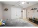 Bright bedroom with a large closet, comfortable furnishings, and decorative items at 30647 Walker Cup Pl, Wesley Chapel, FL 33543