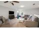 This bonus room offers great space and built-in television with a hammock for relaxing at 30647 Walker Cup Pl, Wesley Chapel, FL 33543
