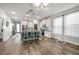 Spacious kitchen featuring an island with barstool seating, and an open plan view into the dining area at 30647 Walker Cup Pl, Wesley Chapel, FL 33543