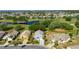 Aerial view of the home surrounded by mature landscaping and nearby community amenities at 334 Northway Dr, Sun City Center, FL 33573