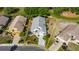 Aerial view of home displaying landscaping and outlining the property at 334 Northway Dr, Sun City Center, FL 33573