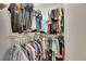Walk-in closet providing ample storage space with organized shelving and hanging racks at 334 Northway Dr, Sun City Center, FL 33573