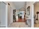 Spacious entryway featuring tile and wood flooring, high ceilings, and decorative accents at 334 Northway Dr, Sun City Center, FL 33573